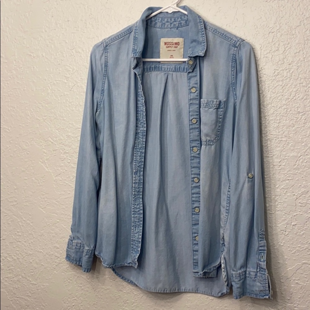 Cotton button down, denim colored.